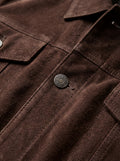 Macro shot of soft brown suede texture and silver hardware detail on trucker jacket. The Callum by Maverick Jacket.