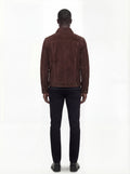 Rear view of male model wearing Maverick Callum suede trucker jacket showing tailored shoulder fit and clean back paneling. Maverick Jacket.