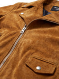 Macro shot of soft tan suede texture and silver zipper hardware on biker jacket. The Atlas by Maverick Jacket.