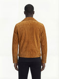 Rear view of male model wearing Maverick Atlas suede biker jacket showing tailored shoulder fit and clean back styling. Maverick Jacket.