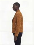Side profile of Maverick Atlas suede biker jacket showing zippered sleeve cuffs and cropped silhouette. Maverick Jacket.