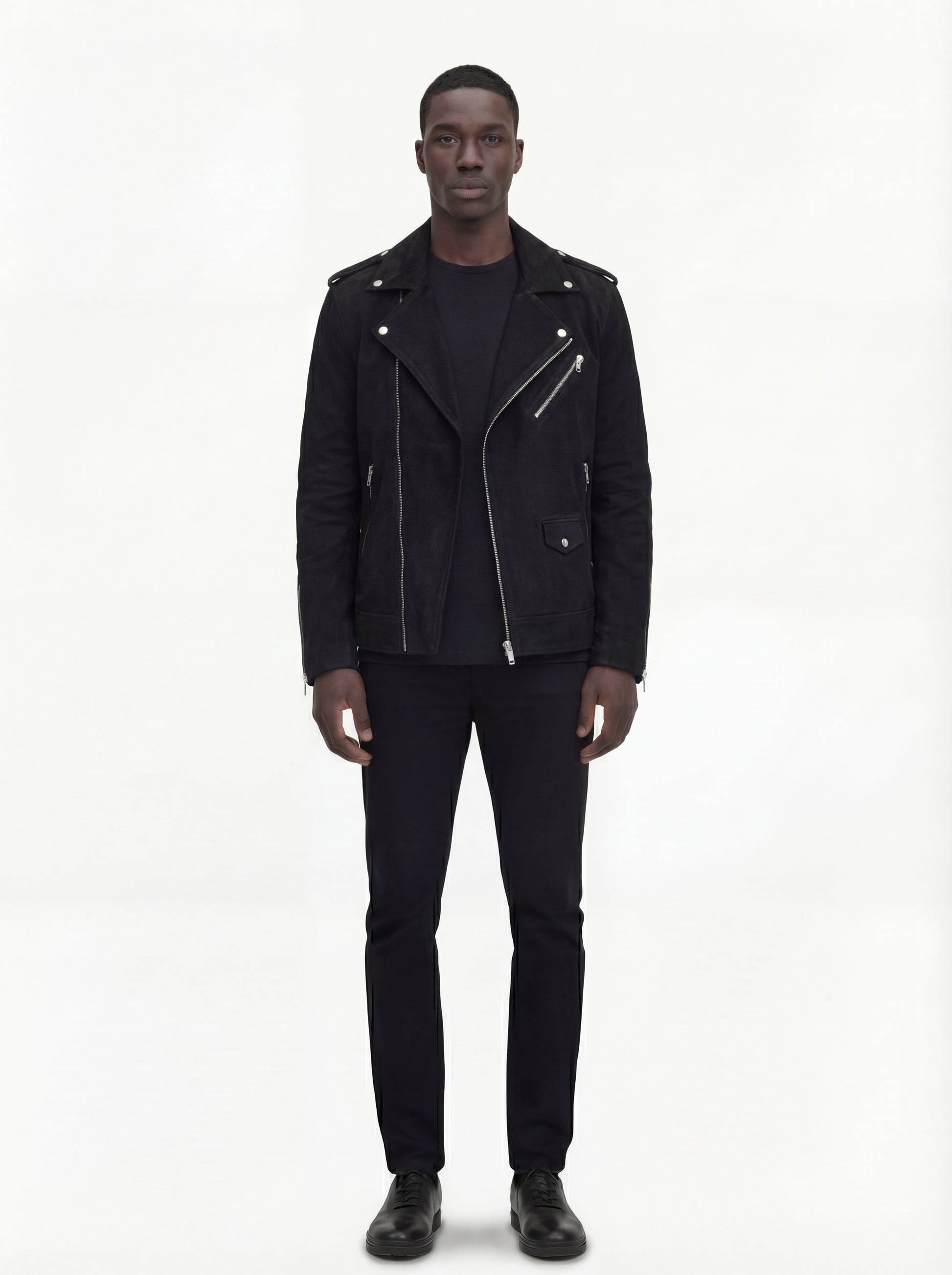 Male model wearing Maverick Silas suede biker jacket, slim fit, styled with black skinny jeans. Maverick Jacket.