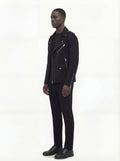 Side profile of Maverick Silas suede biker jacket showing zippered sleeve cuffs and cropped silhouette. Maverick Jacket.