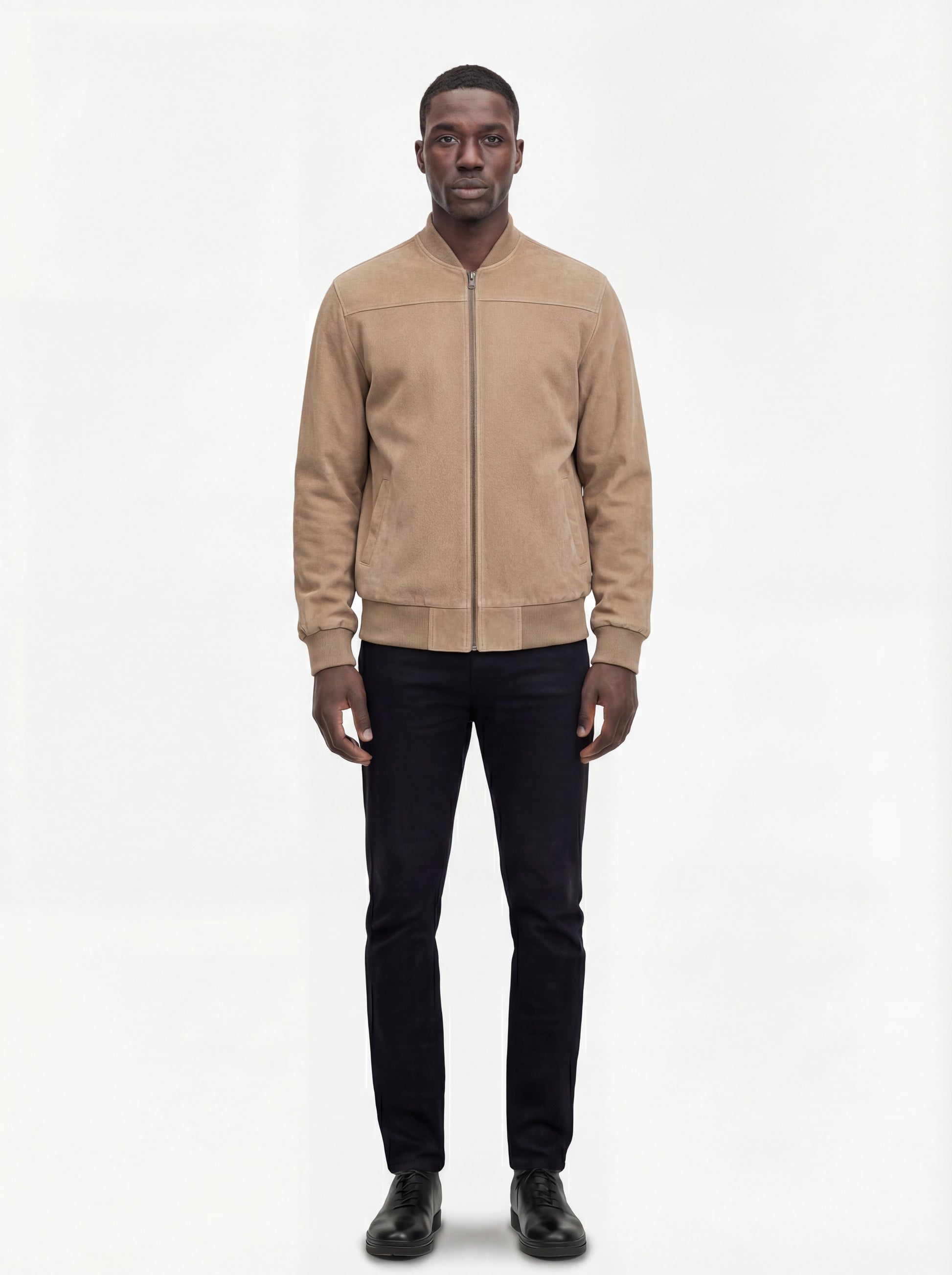 Male model wearing Maverick Cian suede bomber jacket, regular fit, styled with black jeans. Maverick Jacket.
