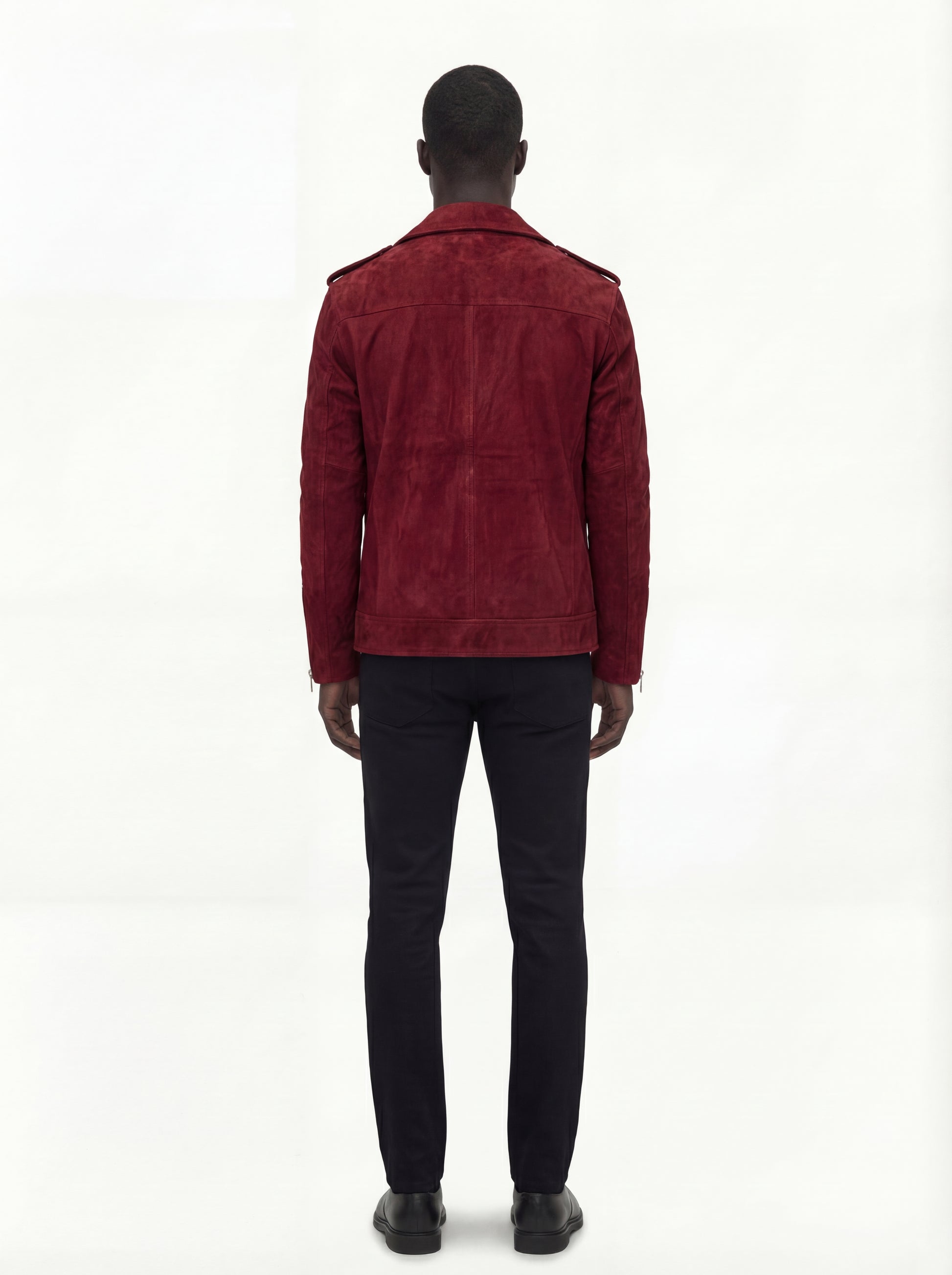 Rear view of male model wearing Maverick Ecliptic suede biker jacket showing tailored shoulder fit and clean back styling. Maverick Jacket.