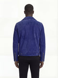 Rear view of male model wearing Maverick Aether suede biker jacket showing tailored shoulder fit and clean back styling. Maverick Jacket.