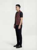 Side profile of Maverick Valor leather biker vest showing deep armhole cut and cropped biker silhouette. Maverick Jacket.