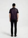 Rear view of male model wearing Maverick Rocco leather biker vest showing broad shoulder fit and clean back yoke styling. Maverick Jacket.