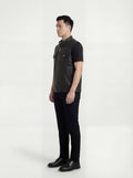 Side profile of Maverick Riot leather biker vest showing deep armhole cut and cropped biker silhouette. Maverick Jacket.