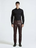 Male model wearing Maverick Kade leather trousers, slim fit, styled with black long-sleeve button-up shirt. Maverick Jacket.