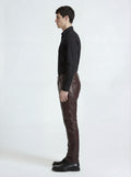 Side profile of Maverick Kade leather trousers showing knee articulation and straight silhouette. Maverick Jacket.