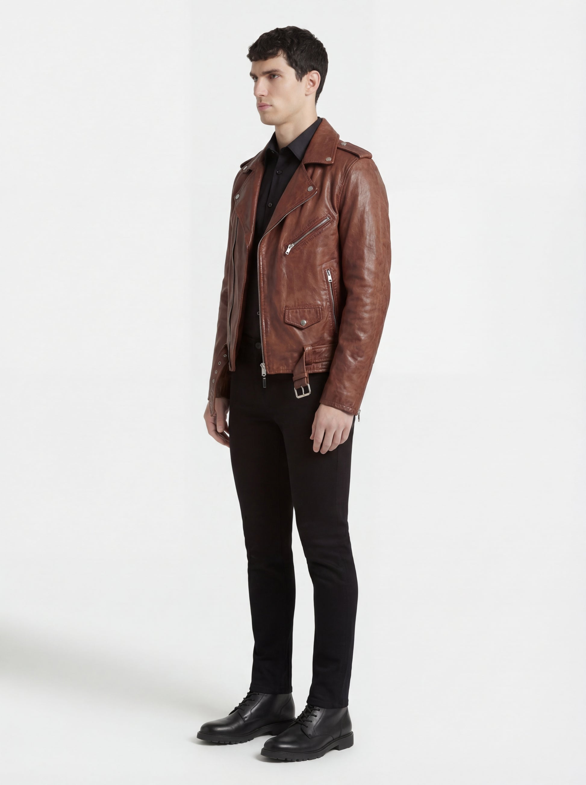 Side profile of Maverick Apex biker jacket showing zippered sleeve cuffs and tailored torso fit. Maverick Jacket.