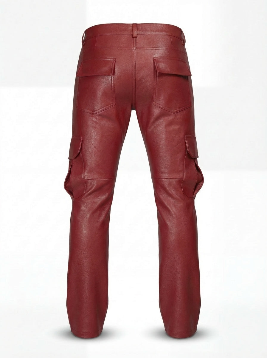 Rear view of red leather cargo pants showing rear button-flap pockets and knee articulation seams. The Cassian by Maverick Jacket.