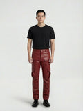 Male model wearing Maverick Cassian leather cargo pants, regular fit, styled with black crewneck t-shirt. Maverick Jacket.
