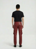 Rear view of male model wearing Maverick Cassian leather cargo pants showing tailored seat fit and straight leg structure. Maverick Jacket.