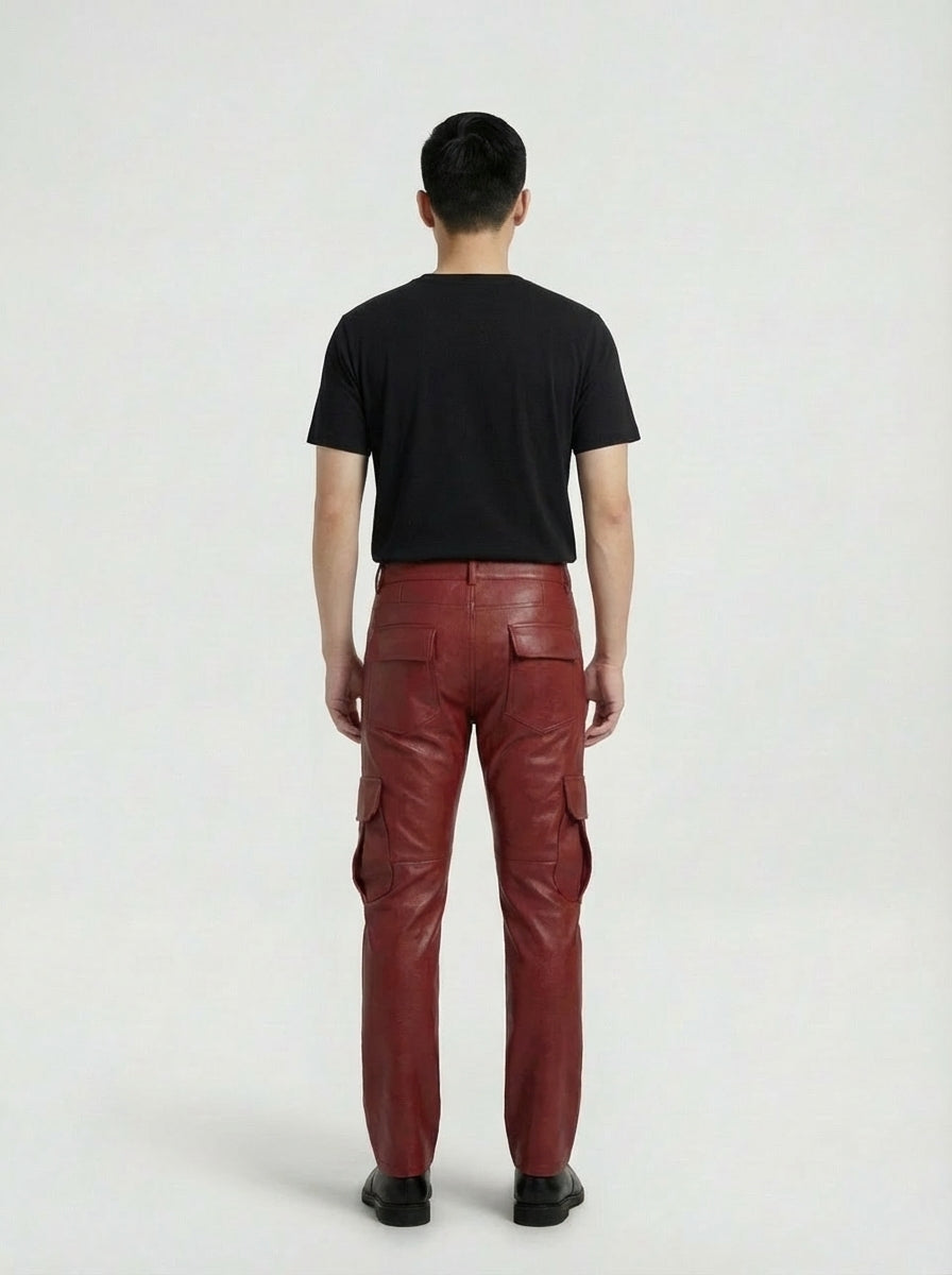 Rear view of male model wearing Maverick Cassian leather cargo pants showing tailored seat fit and straight leg structure. Maverick Jacket.