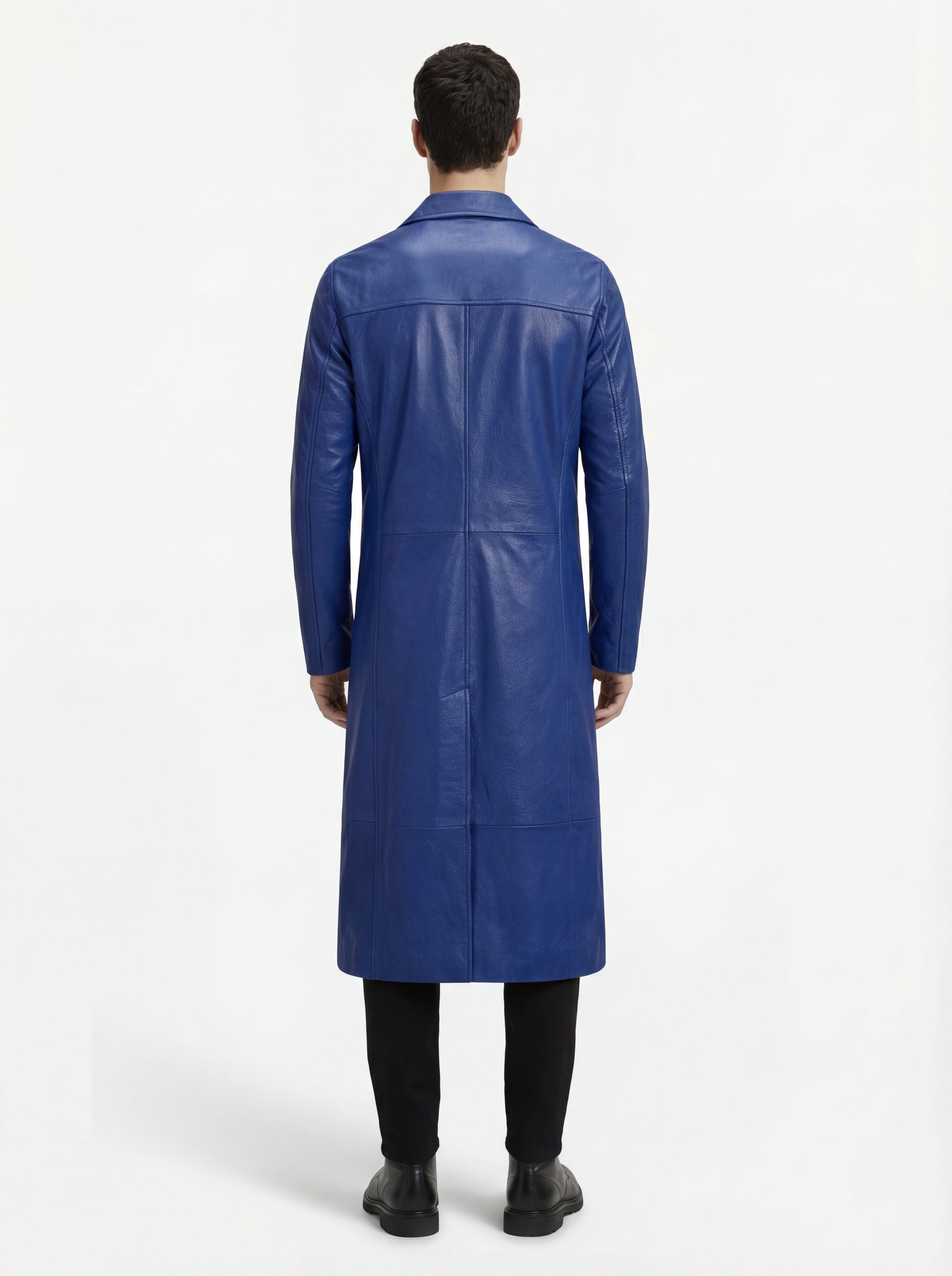 Rear view of male model wearing Maverick Regent leather Mac Coat showing structured shoulder fit and long vertical back seams. Maverick Jacket.