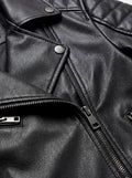 Macro shot of grained black leather texture and silver zipper lapel detail on biker jacket. The Scarlett by Maverick Jacket.