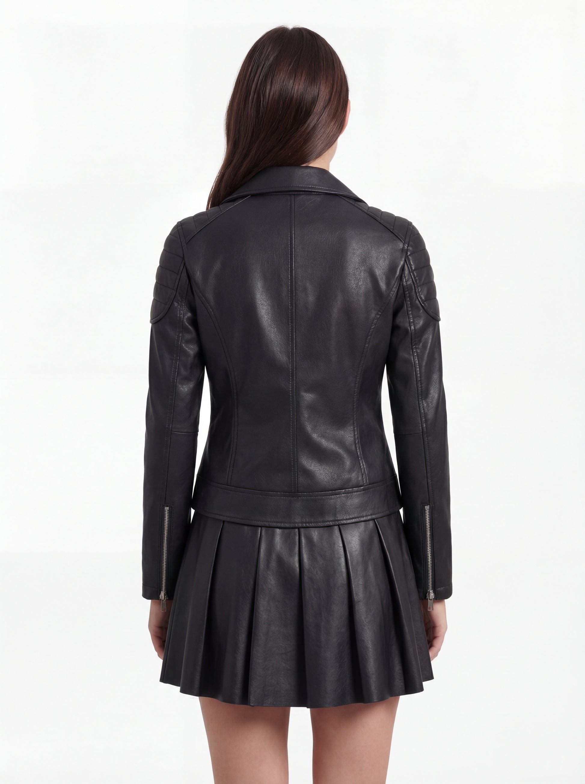 Rear view of female model wearing Maverick Scarlett leather biker jacket showing structured shoulder fit and quilted panel construction. Maverick Jacket.