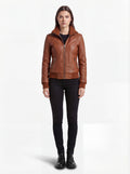 Female model wearing Maverick Blair leather bomber jacket, slim fit, styled with black skinny jeans. Maverick Jacket.