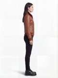 Side profile of Maverick Blair bomber jacket showing long sleeve structure and ribbed cuff detail. Maverick Jacket.