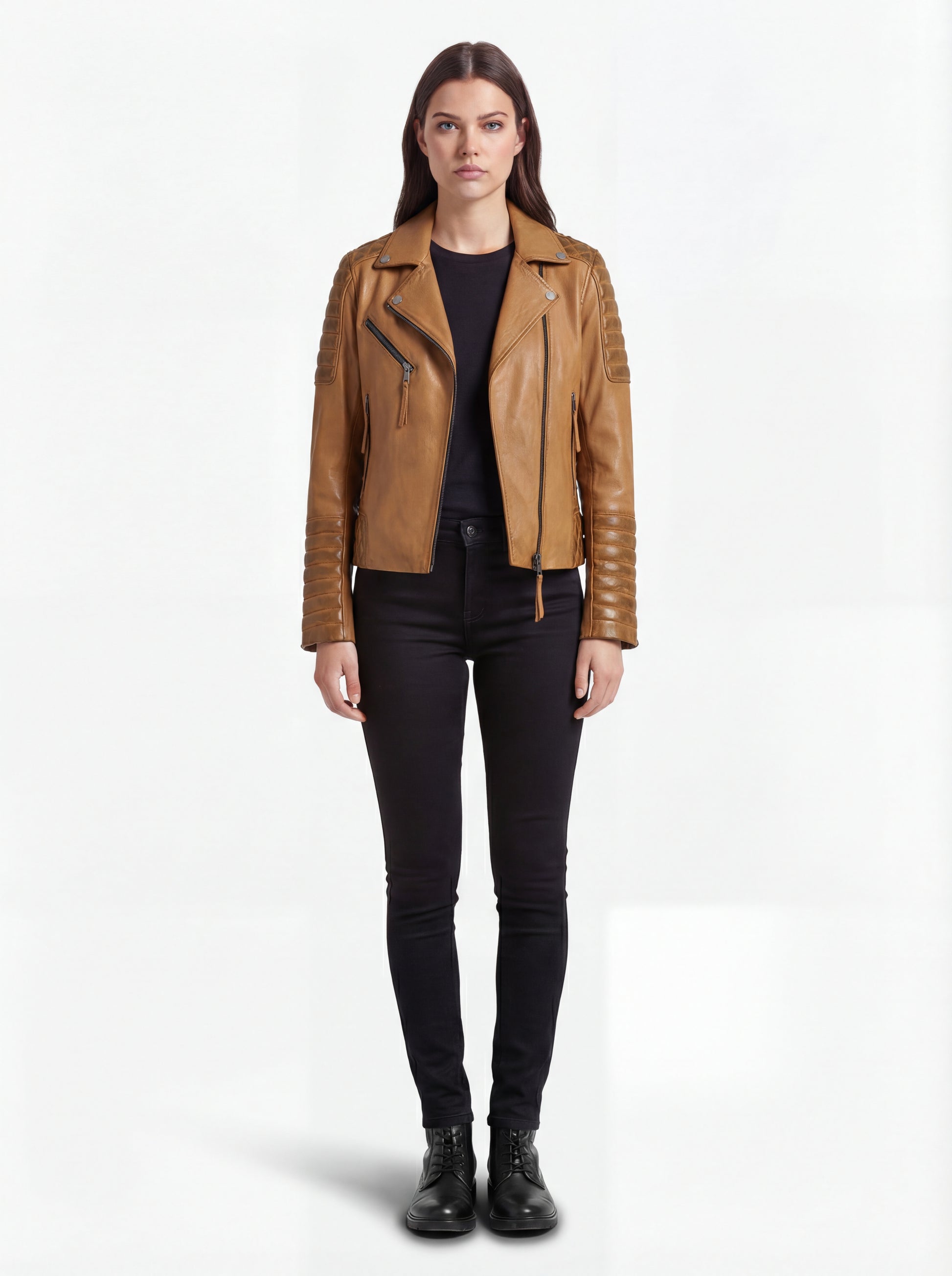Female model wearing Maverick Ava leather biker jacket, slim fit, styled with black skinny jeans and black combat boots. Maverick Jacket.