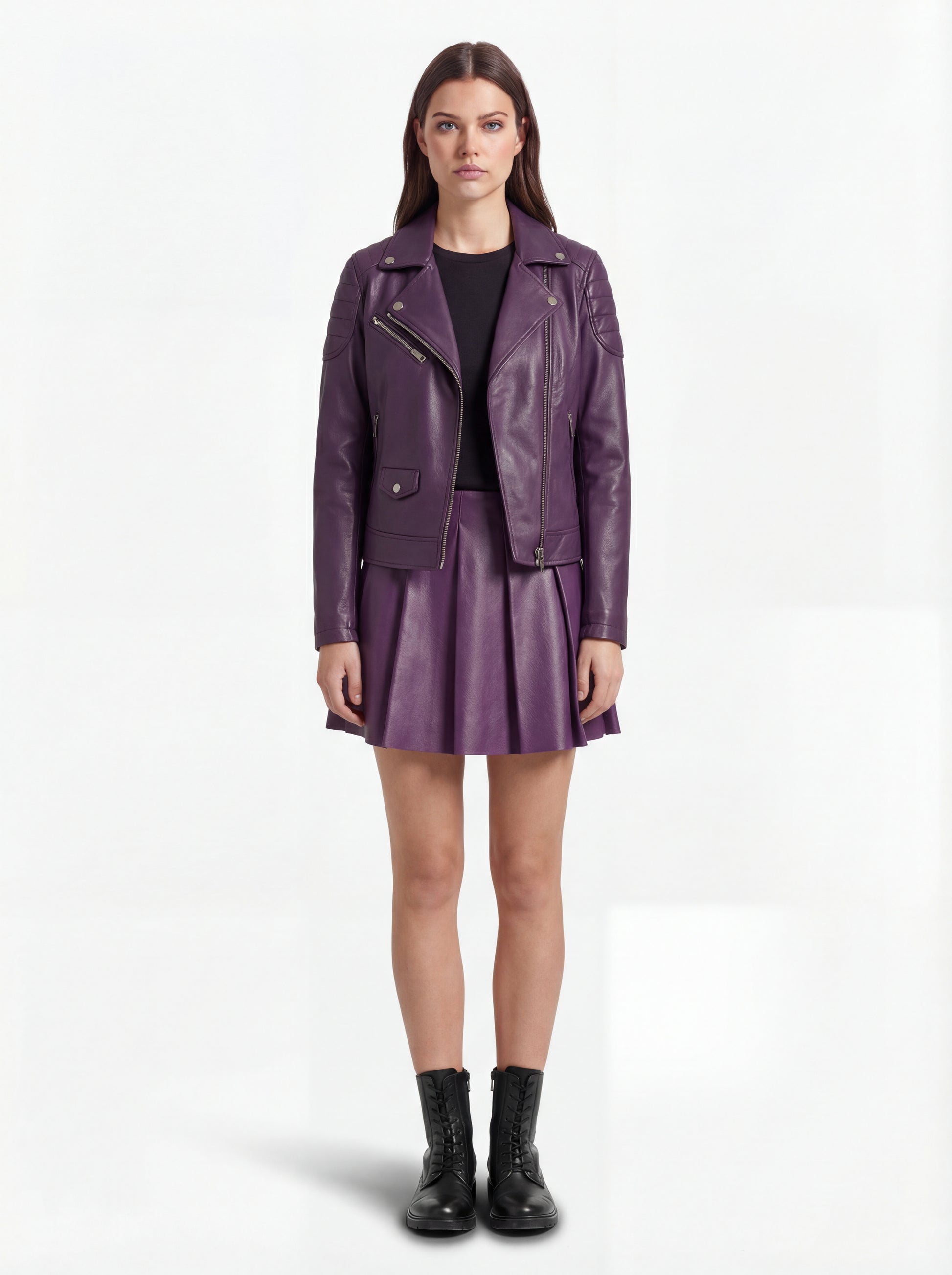 Female model wearing Maverick Iris leather biker jacket, slim fit, styled with Maverick Poppy purple pleated leather skirt. Maverick Jacket.