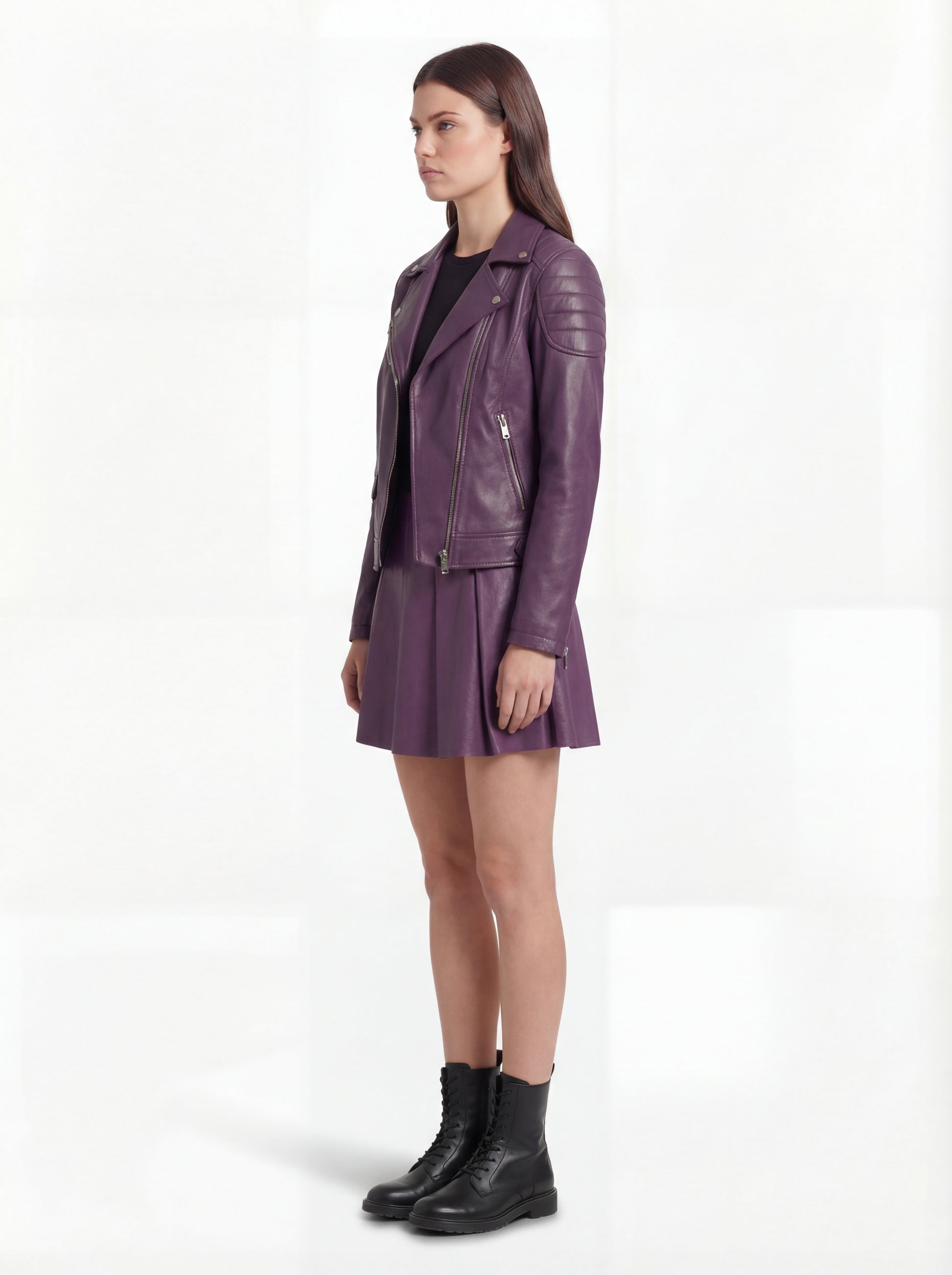 Side profile of Maverick Iris biker jacket showing long sleeve zipper cuffs and cropped waist silhouette. Maverick Jacket.