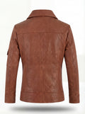 Rear view of tan leather utility jacket showing vertical back seams and shoulder yoke paneling. The Quinn by Maverick Jacket.