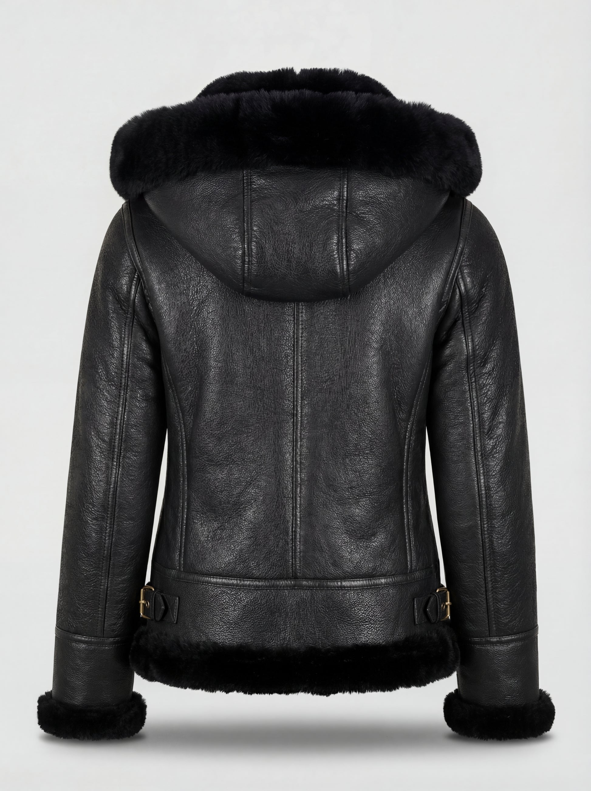 Rear view of black pebbled leather hooded jacket showing paneled hood construction and side waist buckles. The Kira by Maverick Jacket.