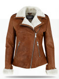Women's whiskey distressed leather shearling biker jacket with white fur notched lapels and asymmetric silver zipper, Front View. The Astra by Maverick Jacket.