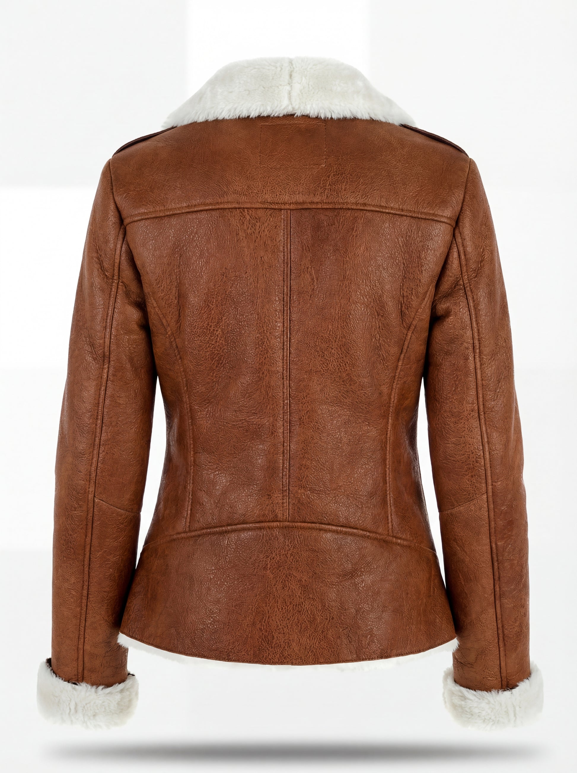 Rear view of whiskey brown leather biker jacket showing vertical center seam and structured shoulder yoke. The Astra by Maverick Jacket.
