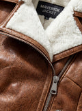 Macro shot of distressed whiskey leather grain and plush white shearling collar texture on biker jacket. The Astra by Maverick Jacket.