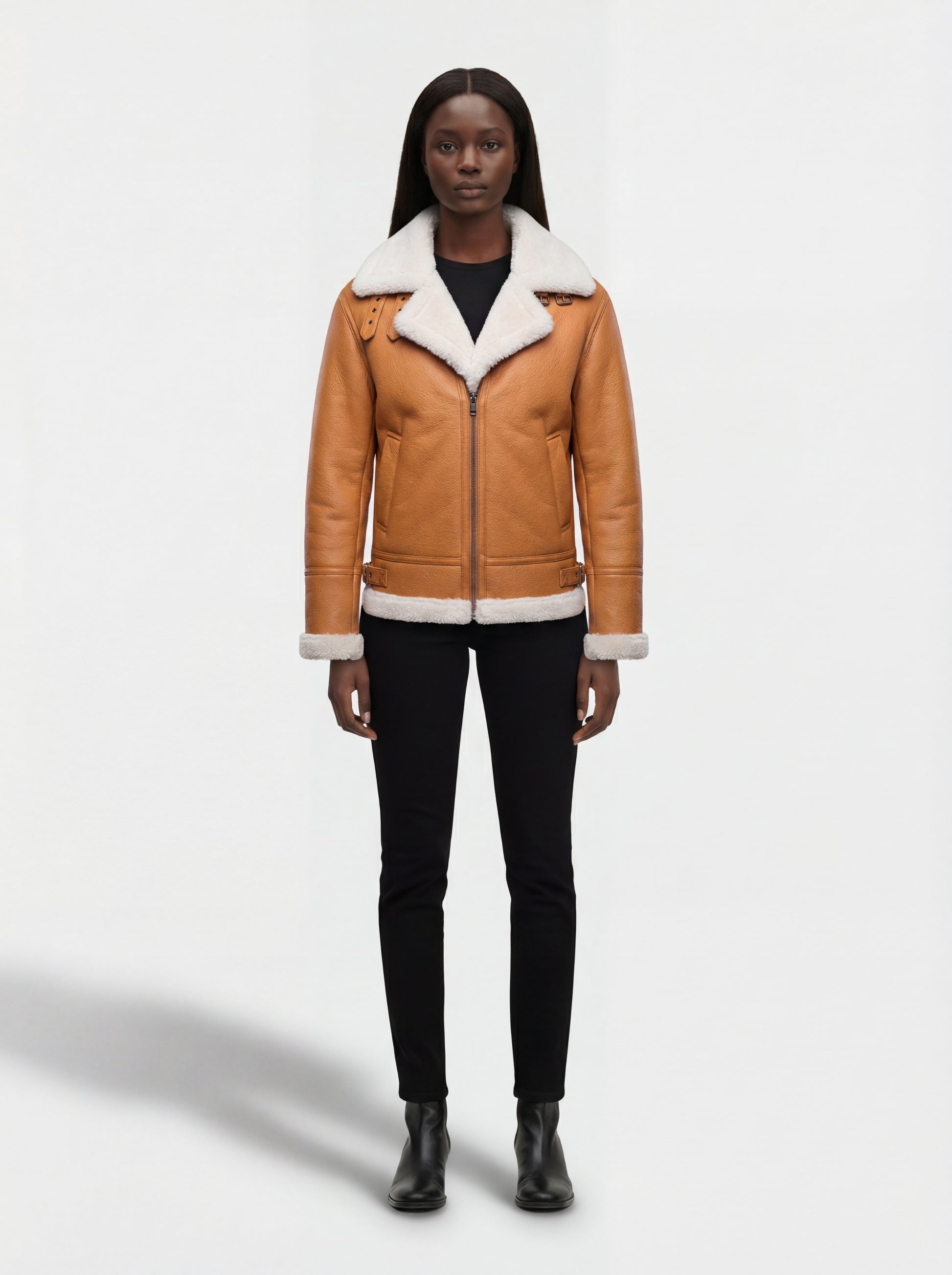 Female model wearing Maverick Flare aviator jacket, regular fit, styled with black skinny jeans and leather ankle boots. Maverick Jacket.