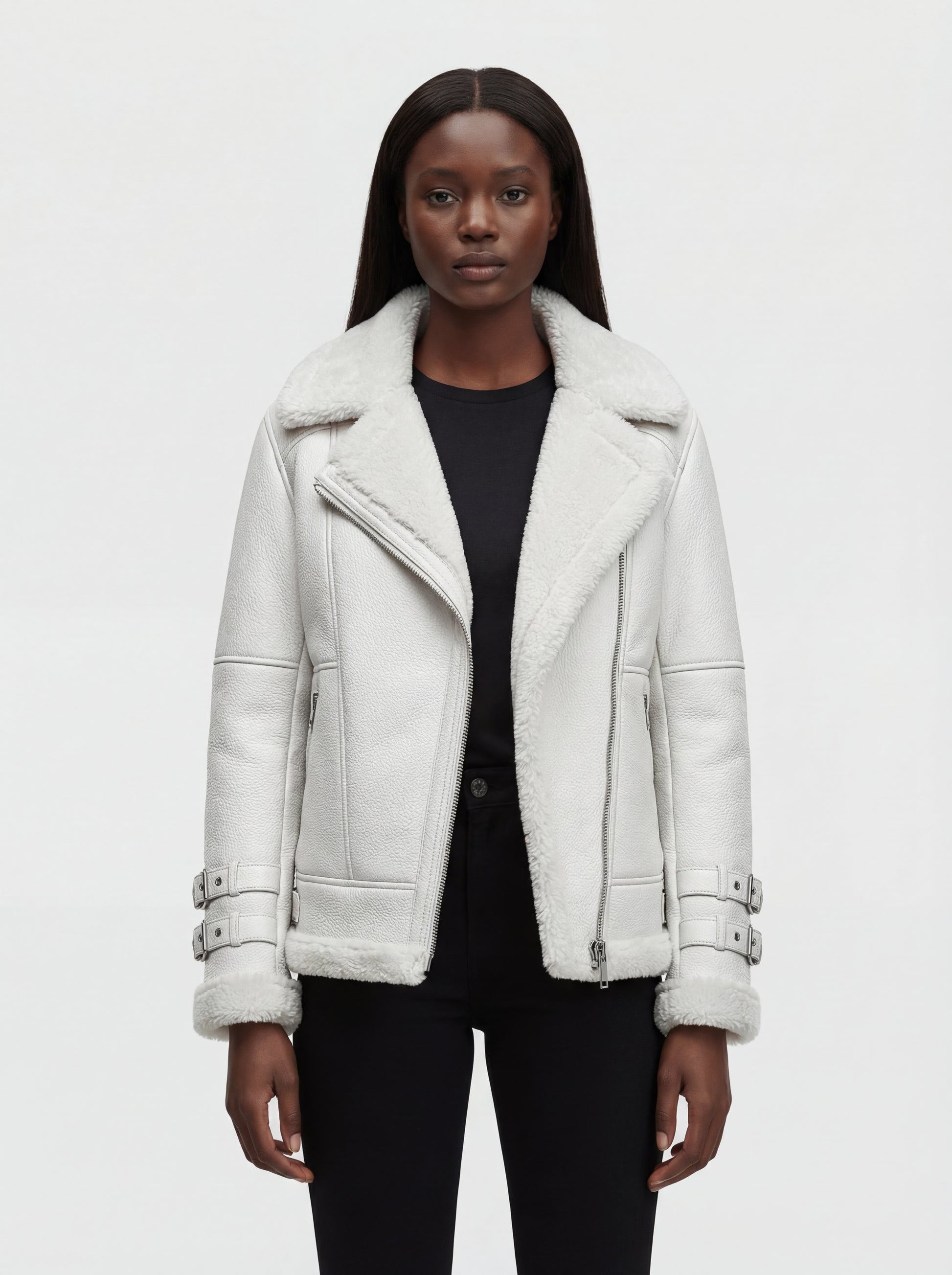 Female model wearing Maverick Polaris biker jacket, regular fit, styled with black skinny jeans. Maverick Jacket.