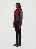 Side profile of Maverick Phoenix biker jacket showing buckled sleeve cuffs and boxy silhouette. Maverick Jacket.