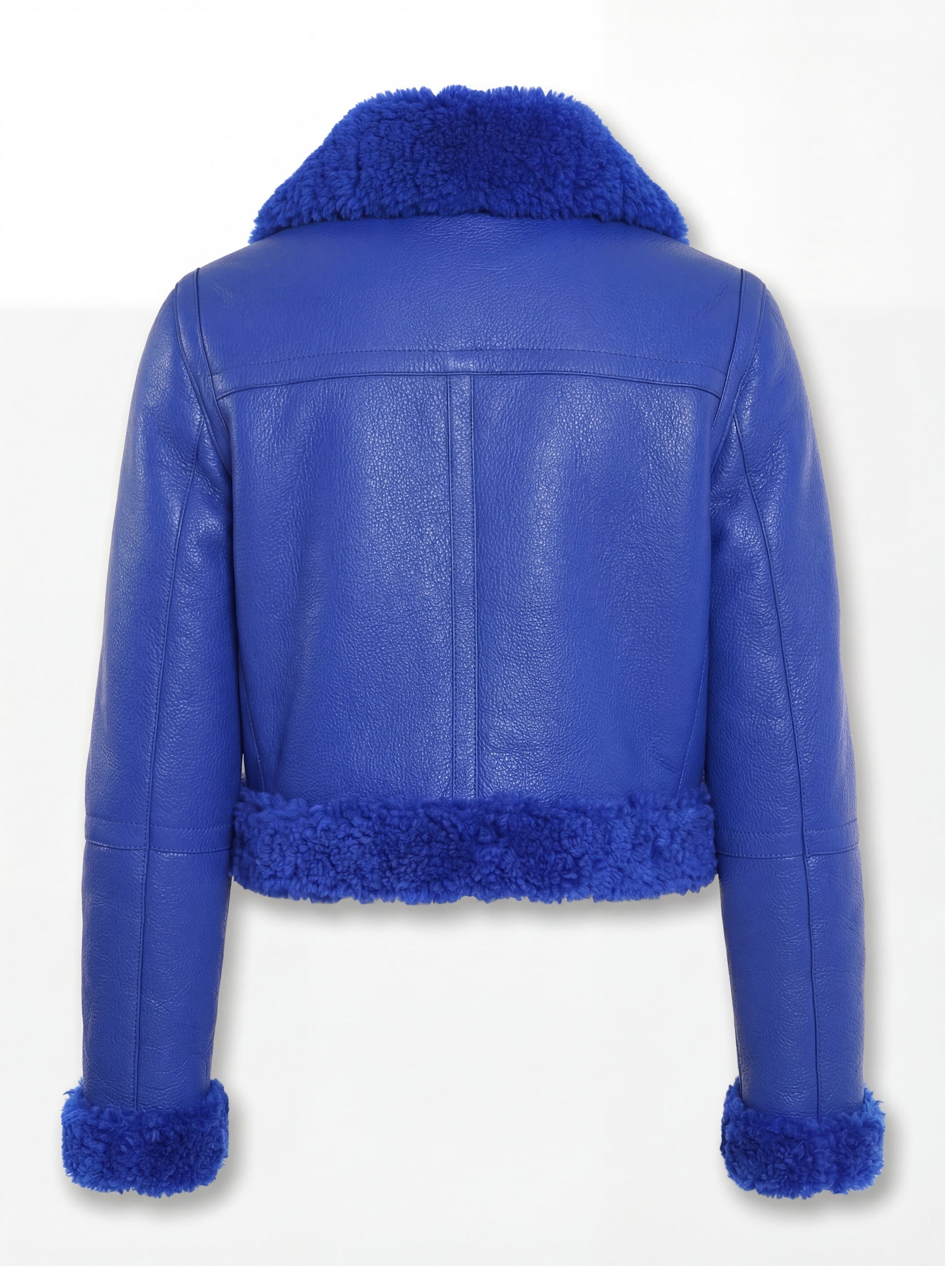 Rear view of blue pebbled leather biker jacket showing vertical center seam and thick blue shearling hem. The Cobalt by Maverick Jacket.