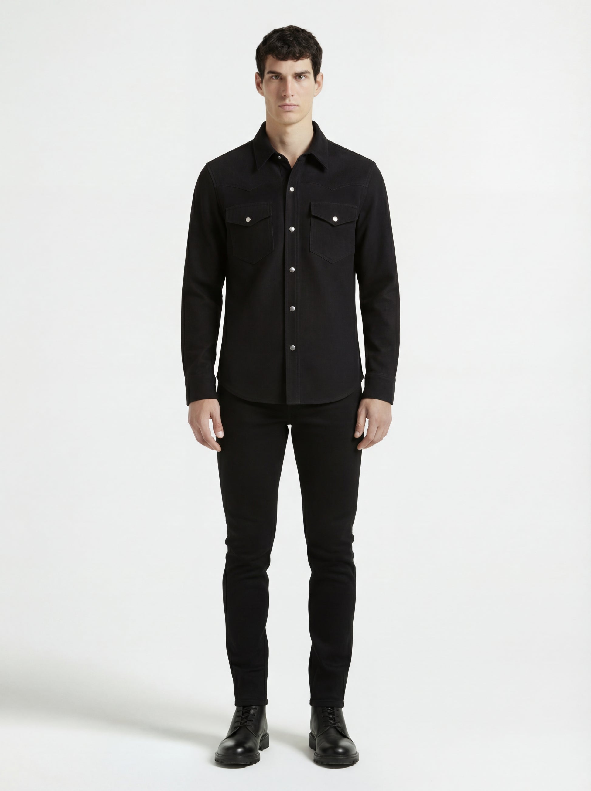 Male model wearing Maverick Cole black suede western shirt, regular fit, styled with black jeans. Maverick Jacket.