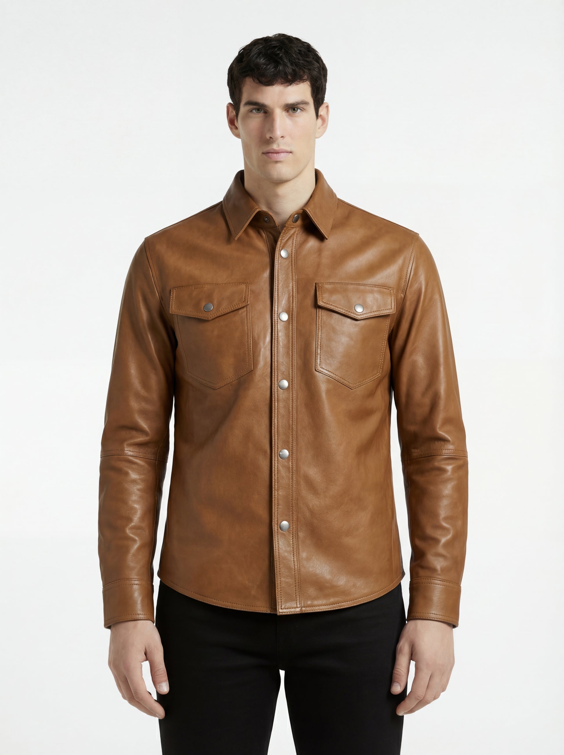 Male model wearing Maverick Colton tan leather western shirt, regular fit, styled with black jeans. Maverick Jacket.
