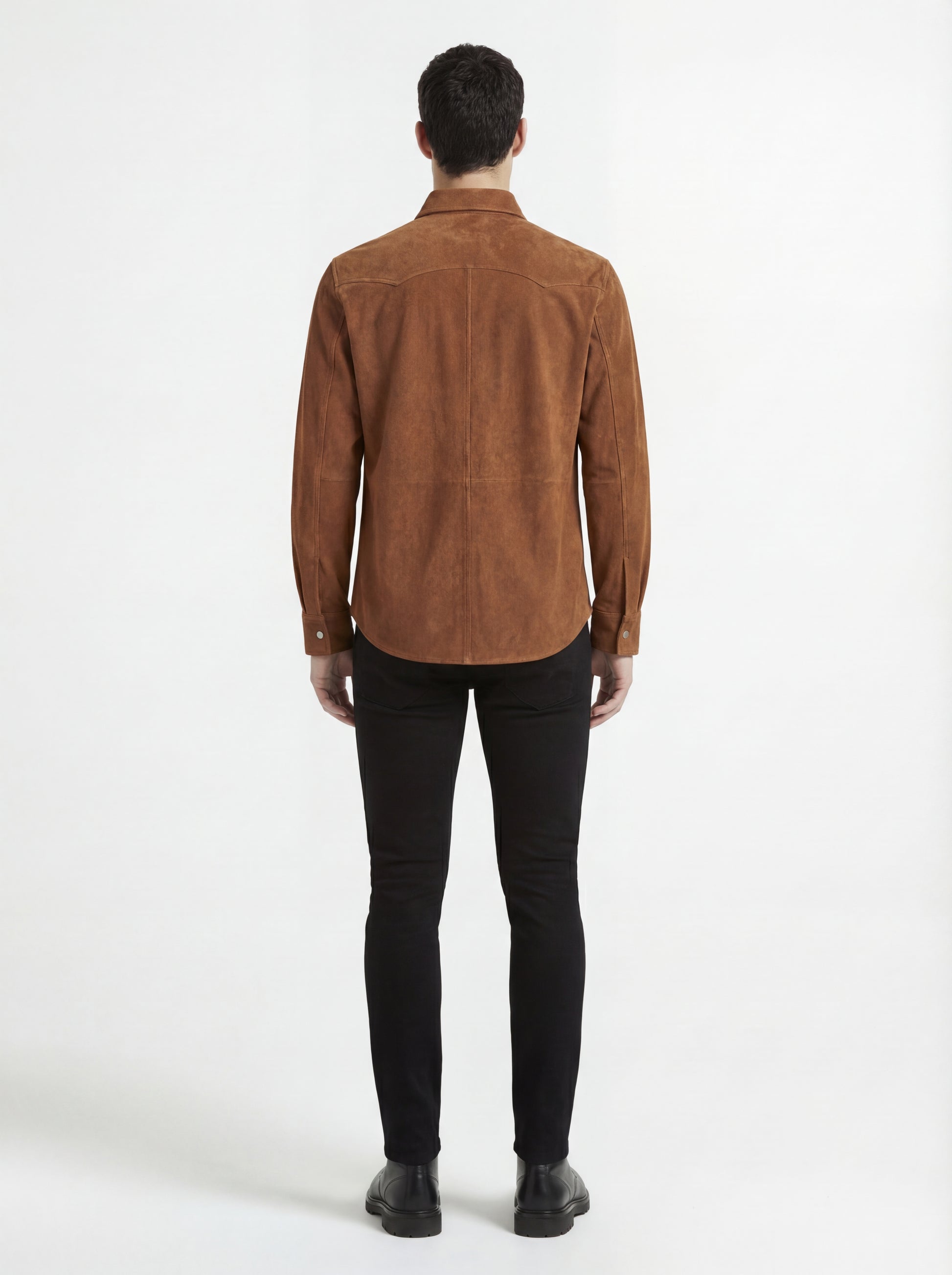 Rear view of male model wearing Maverick Shane suede western shirt showing tailored shoulder fit and western yoke styling. Maverick Jacket.