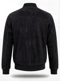 Rear view of black suede bomber jacket showing clean back paneling and ribbed hem. The Felix by Maverick Jacket.