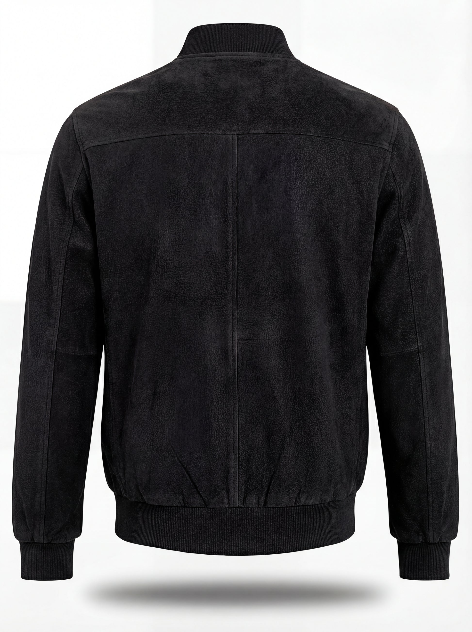 Rear view of black suede bomber jacket showing clean back paneling and ribbed hem. The Felix by Maverick Jacket.