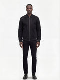 Male model wearing Maverick Felix suede bomber jacket, regular fit, styled with black jeans. Maverick Jacket.