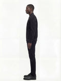 Side profile of Maverick Felix suede bomber jacket showing ribbed sleeve cuffs and classic bomber silhouette. Maverick Jacket.