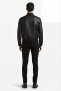 Side profile of Maverick Vanta bomber jacket showing zippered side pocket detail and tailored sleeve silhouette. Maverick Jacket.