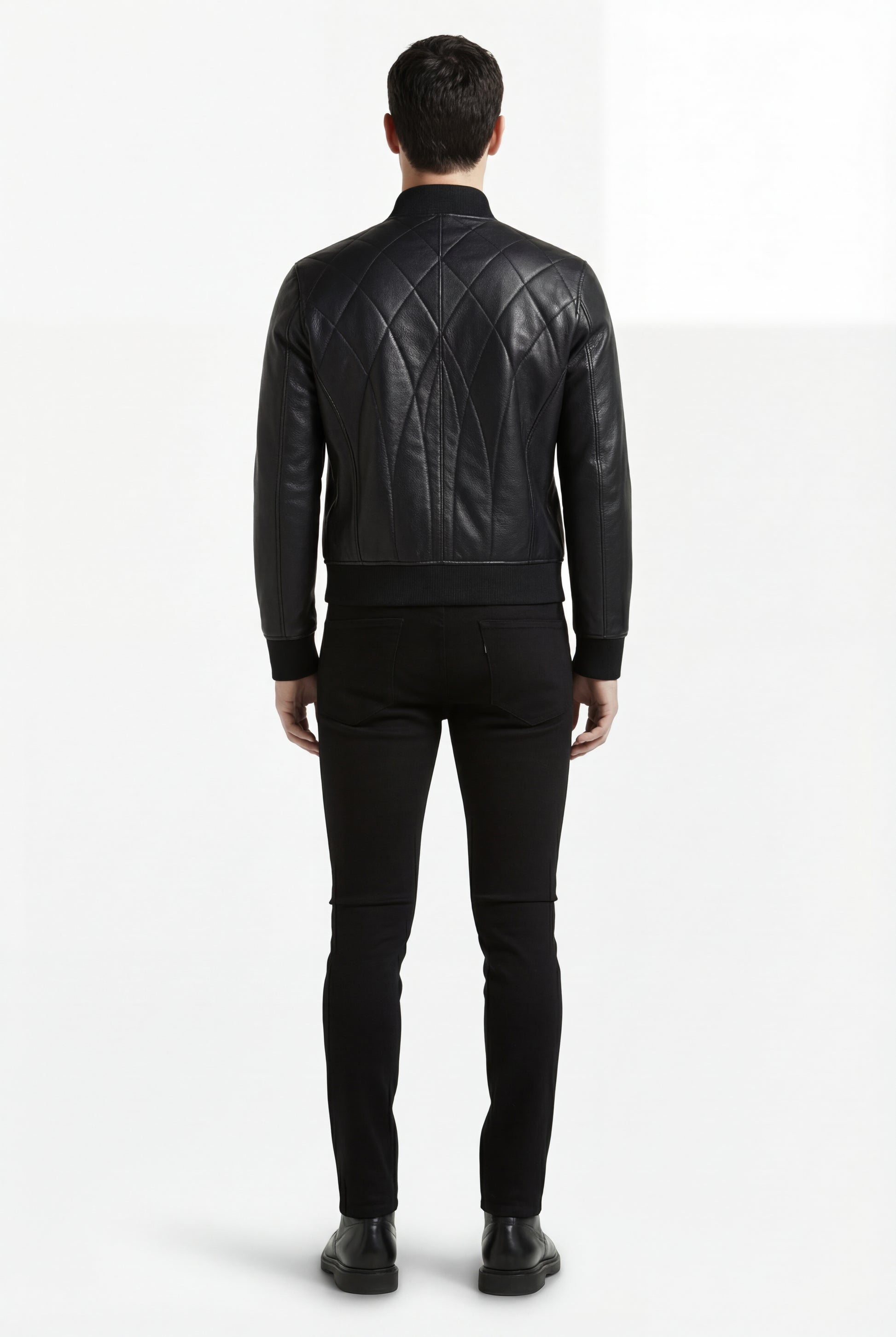 Side profile of Maverick Vanta bomber jacket showing zippered side pocket detail and tailored sleeve silhouette. Maverick Jacket.