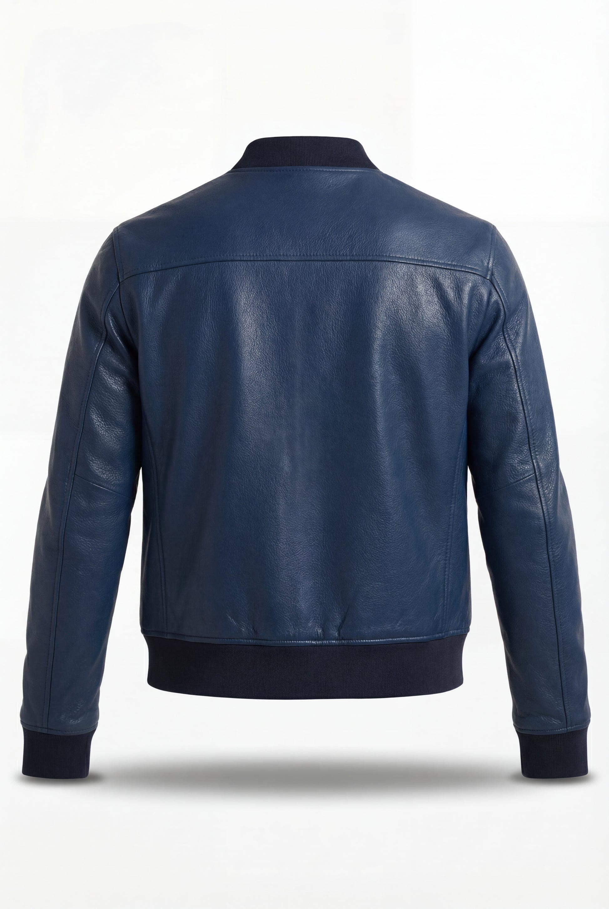 Rear view of navy blue leather bomber jacket showing horizontal shoulder yoke and clean back panel. The Solaro by Maverick Jacket.