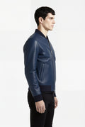Side profile of Maverick Solaro leather bomber jacket showing ribbed cuff structure and slim tailored silhouette. Maverick Jacket.