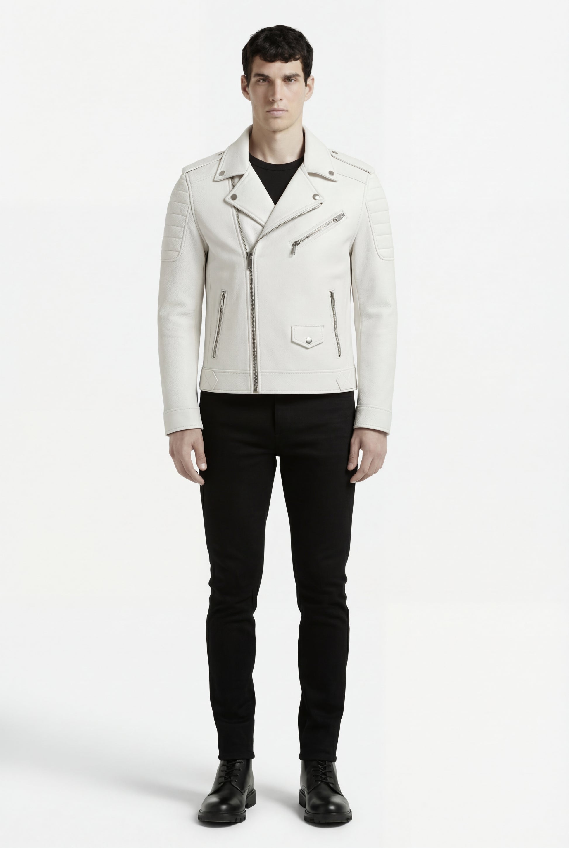 Male model wearing Maverick Lucent biker jacket, slim fit, styled with black crewneck t-shirt and black slim trousers. Maverick Jacket.