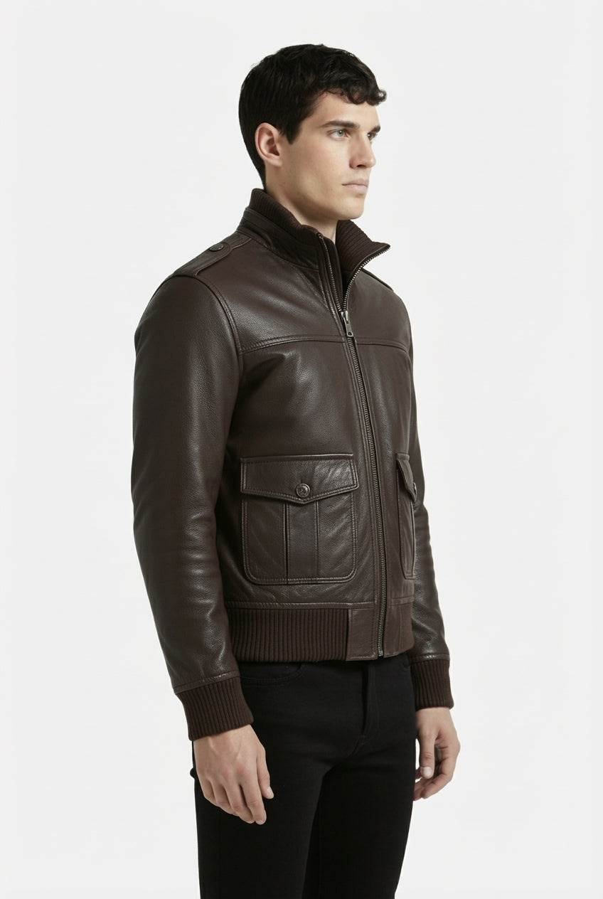 Side profile of Maverick Alder leather bomber jacket showing ribbed cuff structure and classic bomber silhouette. Maverick Jacket.